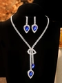 Silver bridal jewelry set with pear-cut blue zircon necklace and matching drop earrings - Silver & Blue Pear-Cut Jewelry Set (PJ--T0096--5)