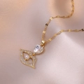 Collier doré avec pendentif cœur et œil, perle et cristaux sur satin champagne - Style Coeur Lèvres Blanc (X2497)