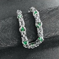 Detailed close-up of Byzantine style steel chain bracelet with green decorative beads - Green