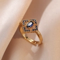 Bague dorée élégante avec un saphir bleu ovale en zircon et un anneau ouvert réglable - Bague Bleu Saphir (J164)