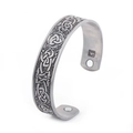 Vintage stainless steel open bangle featuring Celtic knot engravings and magnetic therapy therapy - Antique Silver