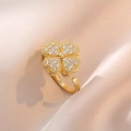 Drehbarer vierblättriger Kleeblattring in Gold mit Zirkonia und verstellbarem Band - Herz Rotierender Ring / Gold