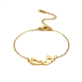 Adjustable gold stainless steel bracelet with hollow baby feet charms on thin chain link - Gold