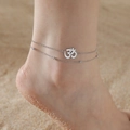 Double-layer silver stainless steel Om anklet with beads on a sandy beach background - Ball Chain / Steel