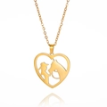 Golden heart necklace featuring a silhouette of a woman and horse on a white background - Gold