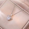 Sparkling silver bow necklace with a large round cubic zirconia pendant on silk background - Bowknot Necklace (X3431)