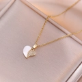 Elegant gold heart pendant necklace with shell inlay and shimmering cubic zirconia stones - Mother Of Pearl Contrast Inlaid Style (X3069)