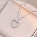 Elegant silver heart necklace with zircon pave on champagne satin jewelry gift box display - Double Heart Overlap Pave Zirconia Style (X1567) / Steel