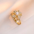 Elegant rotating windmill pearl ring with zircon inlays on premium gold-plated metal - Windmill Rotating Ring (J0251)