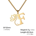 Collier en acier doré lettre F avec pendentif lotus et profil de visage féminin - Lettre F / Or