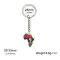 Porte-clés carte Afrique avec émail rouge noir vert et pendentif symbole poing levé - Carte de l'Afrique / Acier