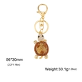 Golden turtle keychain with orange rhinestones and lobster clasp for women bag - Champagne