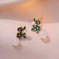 Vintage floral stud earrings with blue enamel petals and pearls on pink silk display - Vintage Agate Style Earrings (E0937)