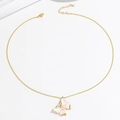 Elegant gold butterfly necklace with shell wings and pink pearl on white background - Necklace