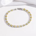 Detail of silver tennis bracelet with alternating yellow and white oval-cut crystals - Bright Yellow (TT0284)