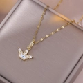 Gold crown necklace with evil eye enamel pendant on gray velvet jewelry box display - Evil Eye Crown Style (X2785)