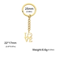 Llavero LOVE de acero inoxidable dorado con detalle de balón de rugby en la letra O - Estilo Tenis - Dorado