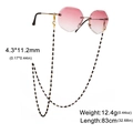 Modieuze zwarte brillenketting met gouden sluitingen en specificaties voor 83 cm lengte - Goud
