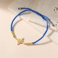 Bracciale nodo della strega intrecciato blu con perline dorate e ciondolo in metallo - modello 2 / Blu