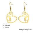 Golden volleyball heart earrings in stainless steel with athlete silhouette design - Serving Pose Style - Gold