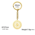 Golden stainless steel keychain featuring a geometric hollow flower of life pendant with chain - Gold