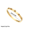 Detailed view of gold stainless steel bangle with flower charms and size dimensions - Rose And Daisy Flowers Style (SZ395) / Gold