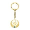 Llavero dorado con cruz Ankh, ojo de Horus y piedra azul sobre fondo blanco - Dorado