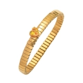 Detail eines goldenen Armbands mit herzförmigem gelbem Edelstein und Gummiband - Gelbes Herz Elastisches Armband (TT0393)