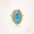 Makroaufnahme des goldenen Vintage-Rings mit ovalem Türkisstein und schwarzen Adern - Vintage Breites Band Türkis Stil (J0469)