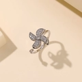 Minimalistischer silberner Windmühlen-Ring mit Zirkonia und verstellbarer Schiene - Stahlfarben
