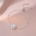 Bracelet ajustable en argent avec pendentif fleur en zircon carré et fermoir coulissant - Bracelet en Zircone Rotatif Couleur Acier