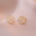 Elegante Blumen-Ohrstecker mit rosa Edelsteinen und weißem Zirkon in Goldfassung - Gold Rosa Rotierende Ohrringe