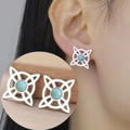 Silver Celtic witch knot earrings with blue turquoise center stone shown on model - Silver Color Witch Knot With Blue Stone