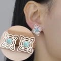 Detailed close-up of Celtic witch knot earrings featuring blue stone in silver setting - Silver Color Double Layer Witch Knot Blue Stone