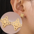 Detailed close-up of golden Celtic witch knot earrings featuring intricate hollow geometry - Gold Color Witch Knot Style 2