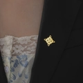 Double-layered golden Wiccan knot brooch in stainless steel on dark suit lapel - Gold Color Witch Knot Style 1