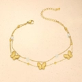 Close-up of double-layer gold anklet with butterfly charms and white pearls details - Radial Pattern Butterfly Pearl Style (TL0018)