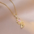 Elegant gold necklace featuring a pink heart stone pendant and sparkling star detail - Gold Heart Tulip