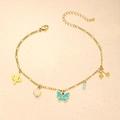 Gold anklet with butterfly, heart, and cherry charms on a classic Figaro chain - Cactus Cherry Style (TL0006)