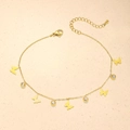 Golden butterfly and zircon anklet with adjustable lobster clasp on light beige background - Five Butterflies Four Rhinestones Style (TL0007)