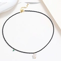 Black beaded necklace with star pendant and pearl detail in elegant minimalist style - Black Beads Mother of Pearl Star Style (X3695)