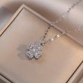 Elegant rotating bauhinia pendant necklace with zircon heart petals in silver finish - Heart Rotating Necklace (525) / Steel