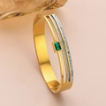 Luxurious gold-plated hollow bangle with a rectangular emerald zircon and side pave stones - Emerald Rectangular Zircon Style (TT0182)