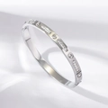 Polished silver titanium steel bangle with heart-shaped sparkling crystals for women - Alternating Stones Style (TT0984-2)