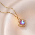 Elegant gold clover necklace with iridescent blue-purple stone and zircon accents - Clover Iridescent Zirconia Style (X0301) / Gold