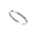 Detailed macro view of silver steel bracelet with green floral inserts and zircon accents - Silver/Green