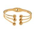 Detail of multi-layer gold plated spring bangle with polished and frosted beads - Six Beads Style (SZ-140)