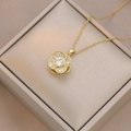 Detail of gold flower pendant necklace with shimmering zircon stones in a gift box - Necklace / Overlapping Petals Style (X3145)
