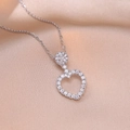 Elegant silver heart necklace set with sparkling zirconia on smooth pink satin background - Necklace (X2671) / Steel