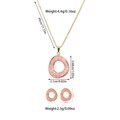 Detailed view of titanium jewelry set showing necklace and earring dimensions and weight - Irregular Oval Style (TZ55) [Pink]